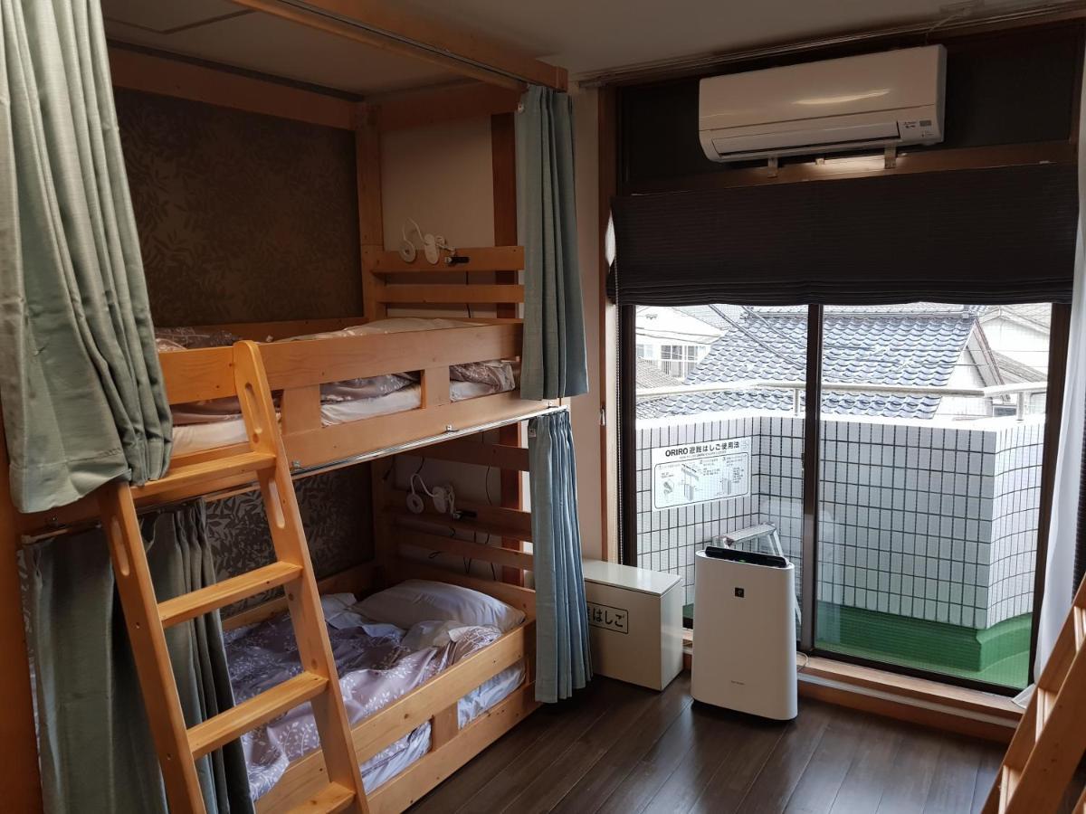 Guesthouse Zink Sado Bagian luar foto