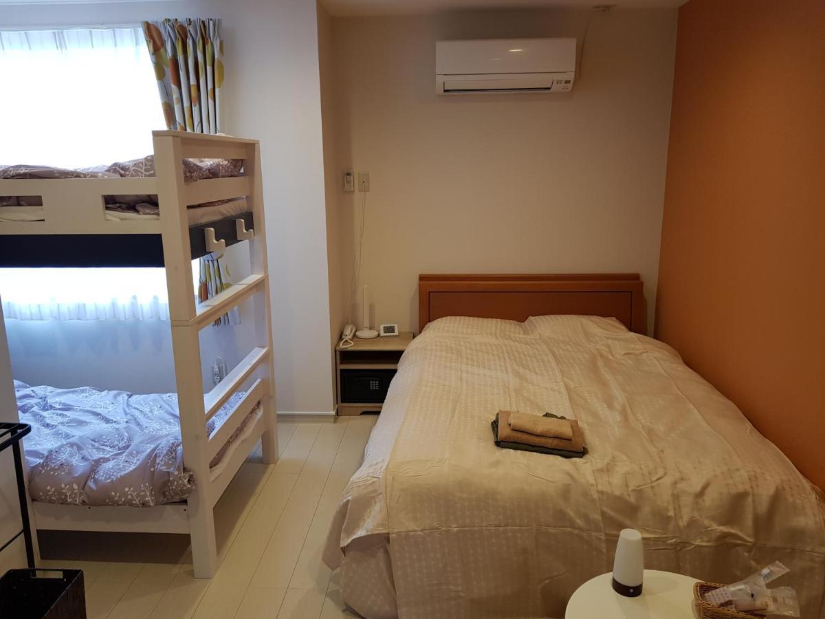 Guesthouse Zink Sado Bagian luar foto