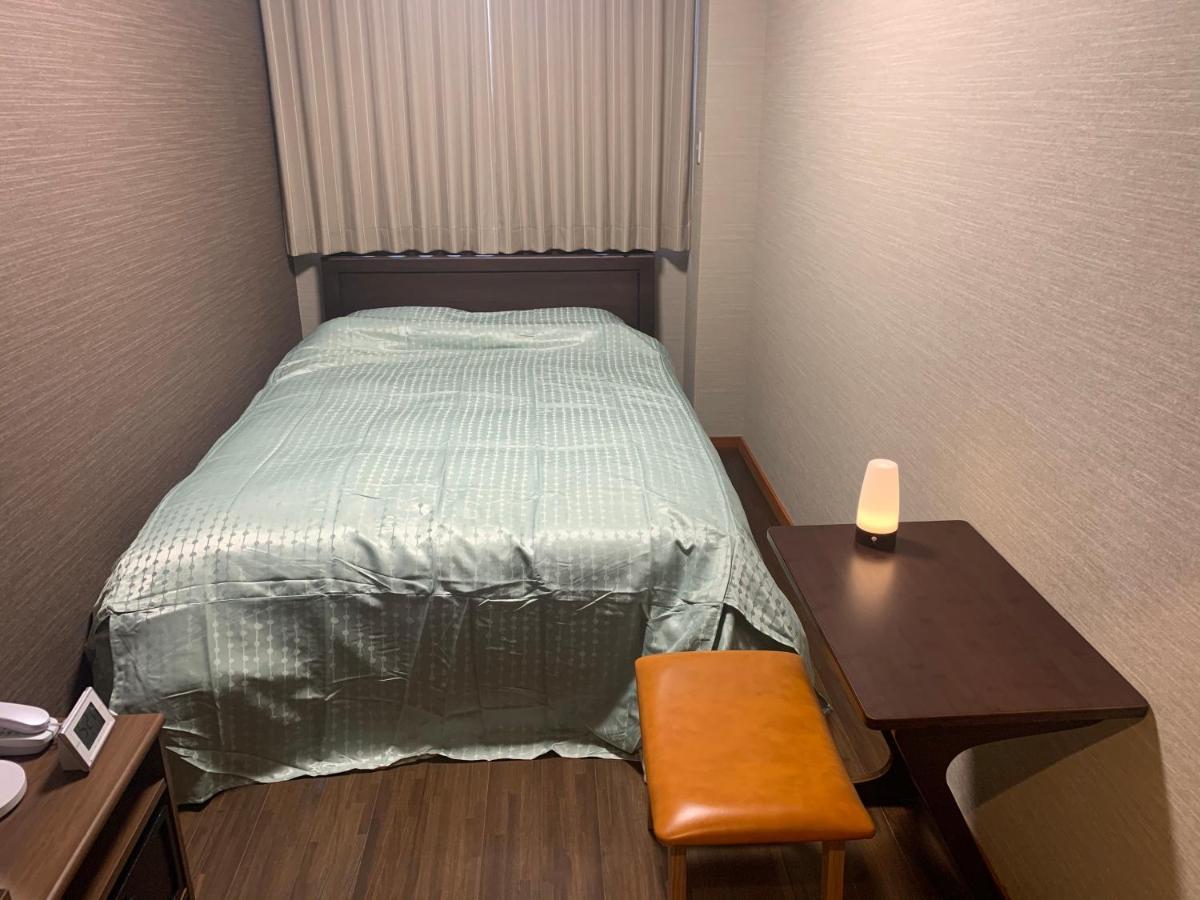 Guesthouse Zink Sado Bagian luar foto