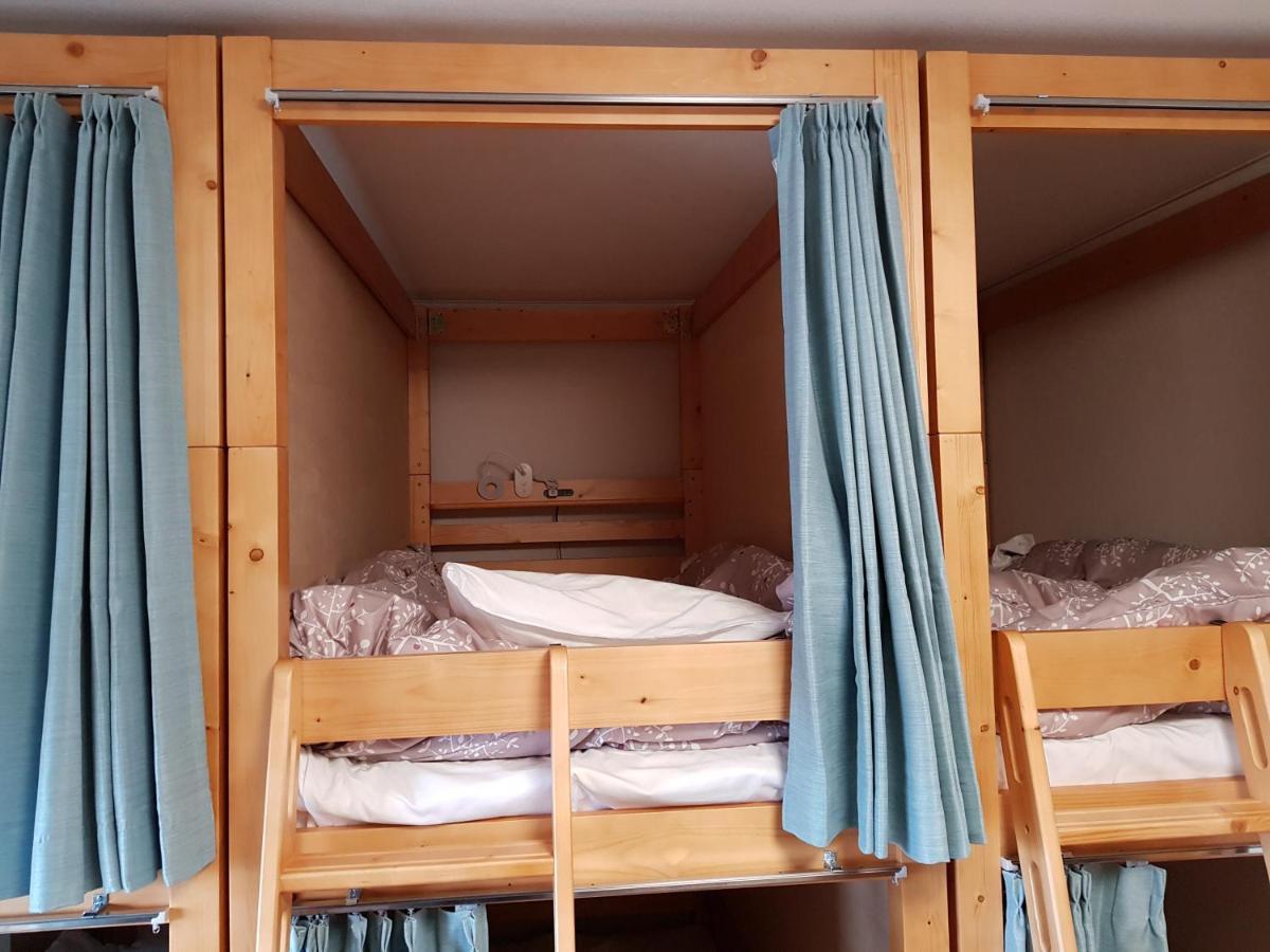Guesthouse Zink Sado Bagian luar foto