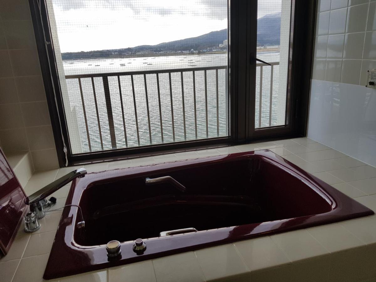 Guesthouse Zink Sado Bagian luar foto