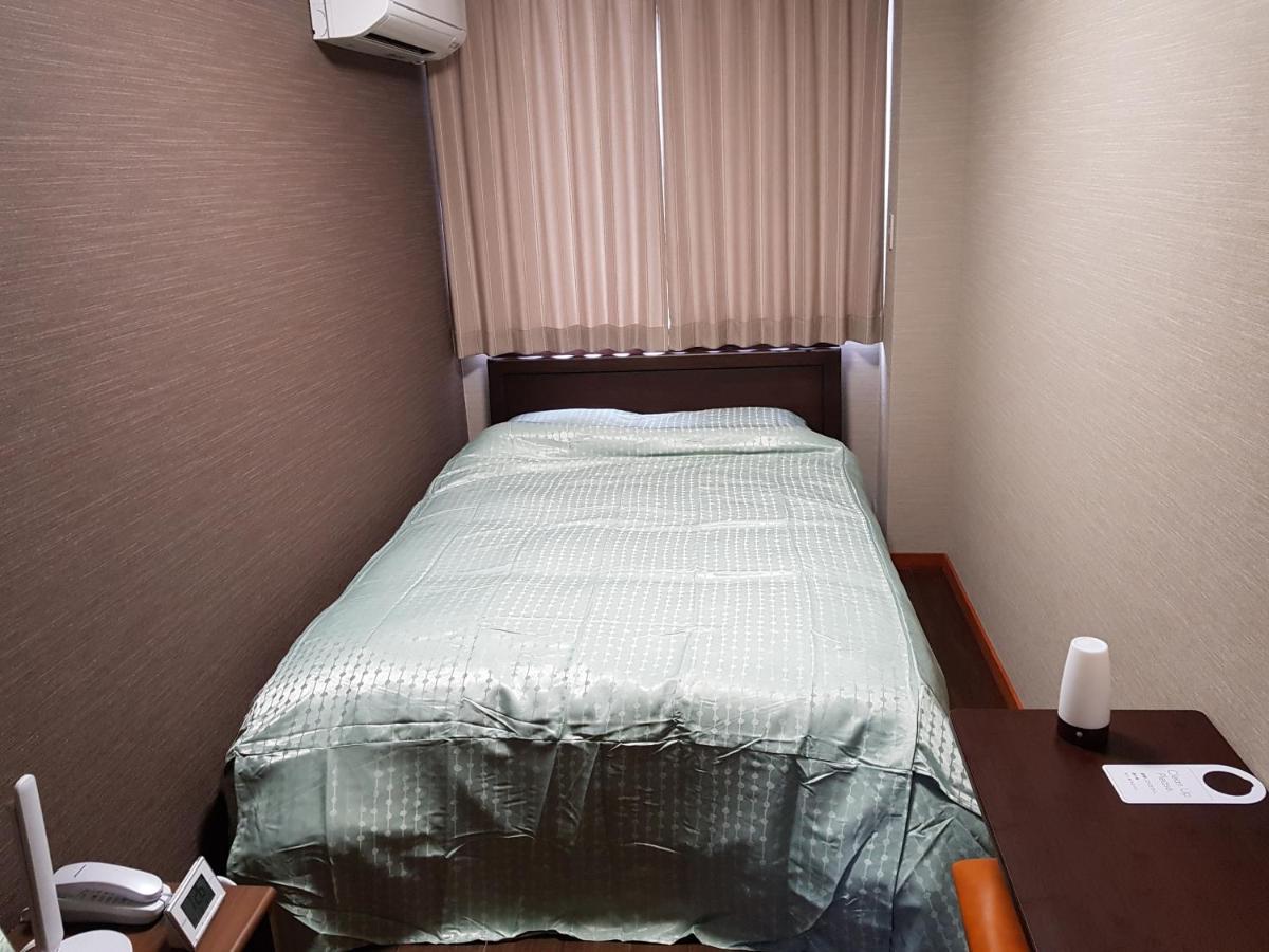 Guesthouse Zink Sado Bagian luar foto